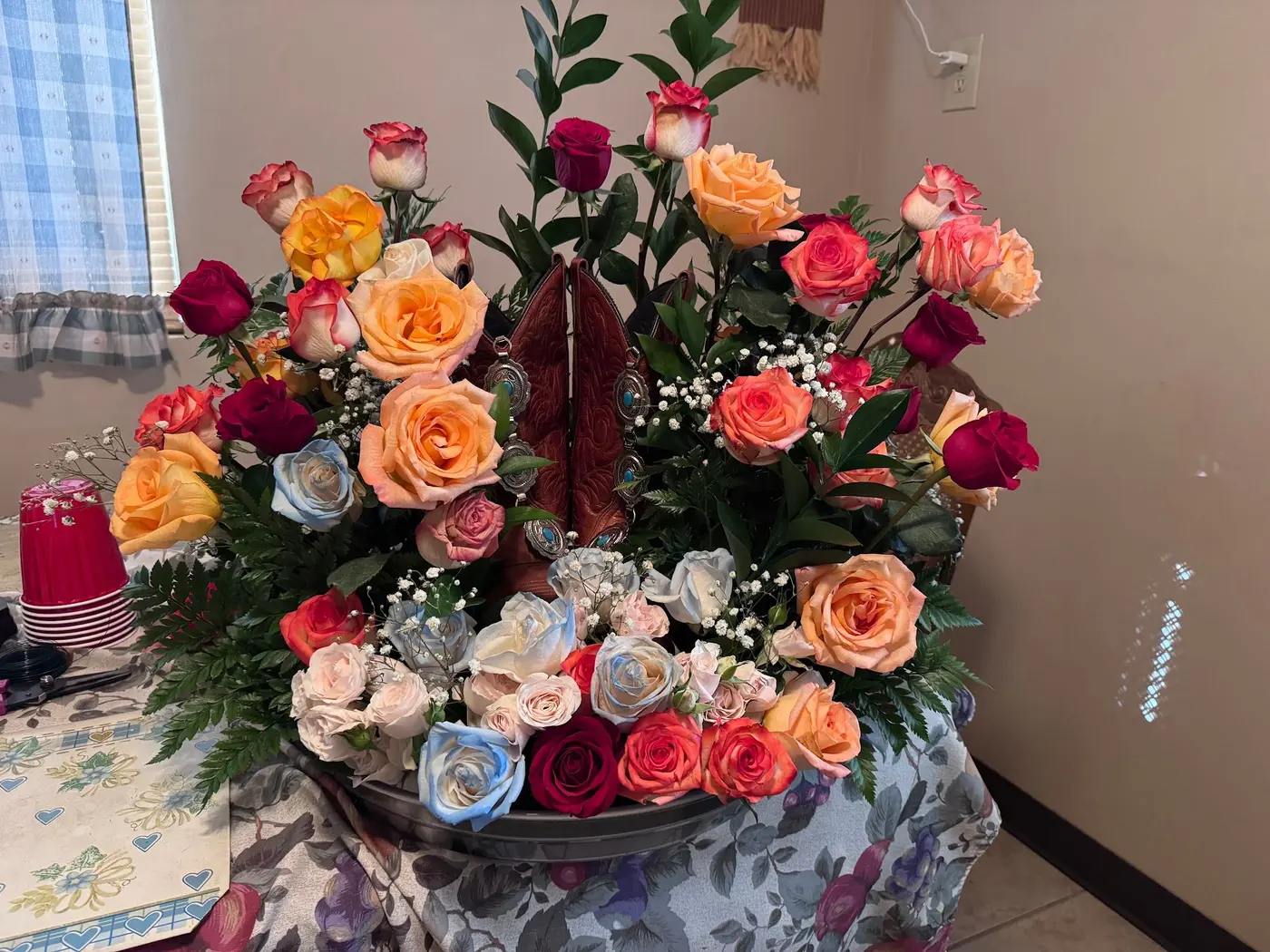 Large arrangement of orange, pink and red roses, florist Tucson AZ