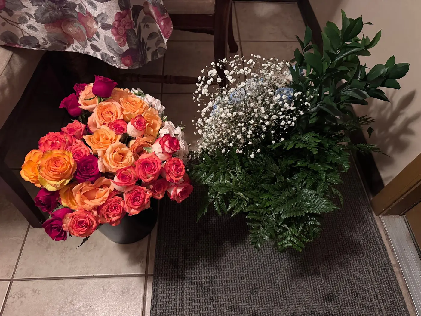Buckets of orange and pink roses and baby’s breath, wholesale flowers Tucson