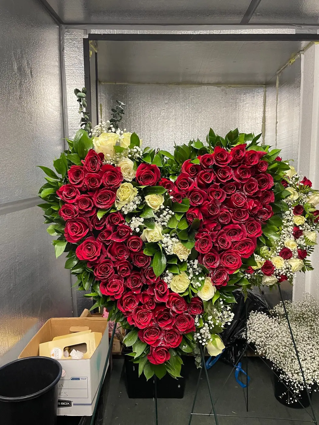 Standing heart of red and white roses, funeral flowers Tucson